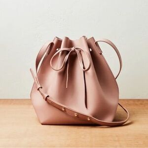 Kayla + Ava
Bow Tie Bucket Bag (in Dusty Rose)